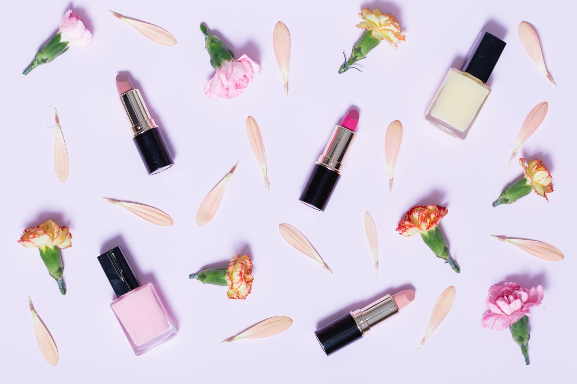 carnations-petals-near-cosmetics