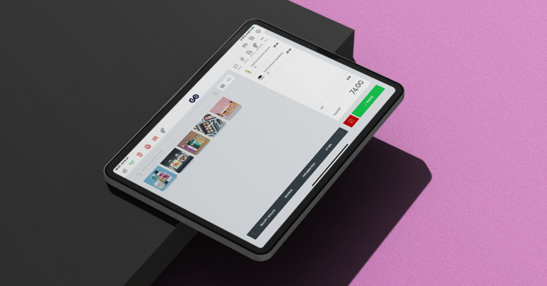 ipad with pos solution on a pink and black backround